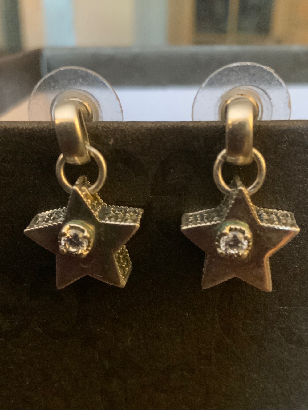 Sterling Silver and Marcasite Star Drop Earrings with CZ Accent.